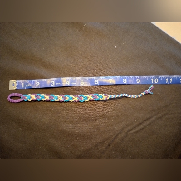 Friendship bracelet 10 inches long. Actual braid reaches 7 inches. Waxed cotton. - Picture 5 of 5